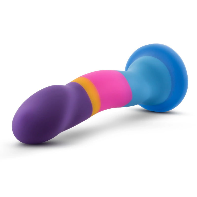 A vibrant multi-colored silicone dildo with a purple tip pink and yellow bands and a blue rounded base