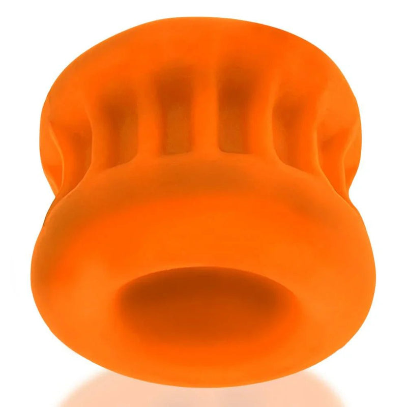 Bright orange silicone chef hat shaped massage tool from the cock and ball collection for targeted relief