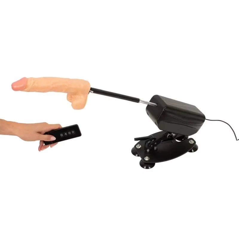Black electric dildo with realistic flesh-colored head and remote control in sex machines collection