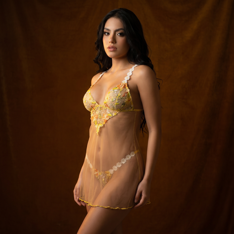 Mapale Lingerie editorial — woman in yellow floral lace camisole set, three-quarter studio fashion campaign