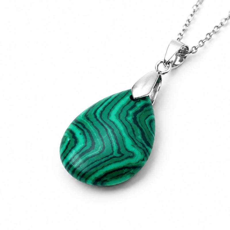 Teardrop green malachite gemstone pendant on a silver chain against a white background.