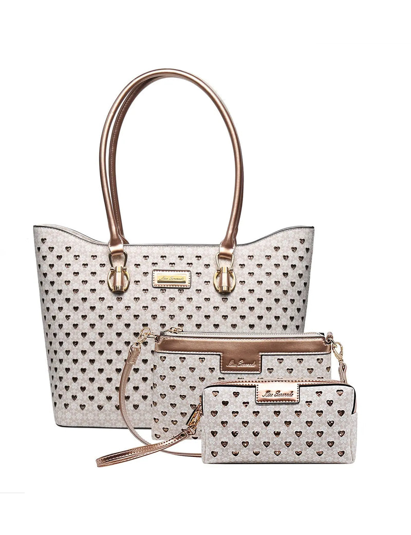 Three matching beige handbags featuring metallic bronze trim and laser-cut heart patterns.