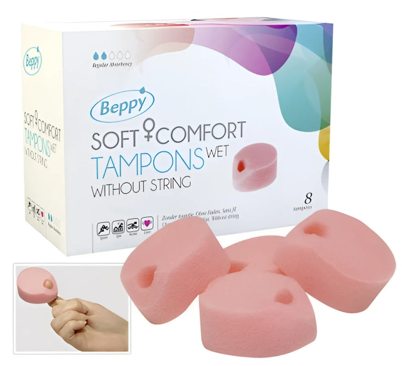 Four Beppy Soft+Comfort Wet foam sponges with retrieval loops beside branded product packaging