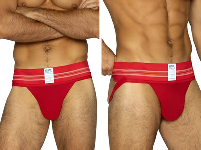 Two images show a muscular man wearing a red jockstrap with a striped waistband against a plain white background.