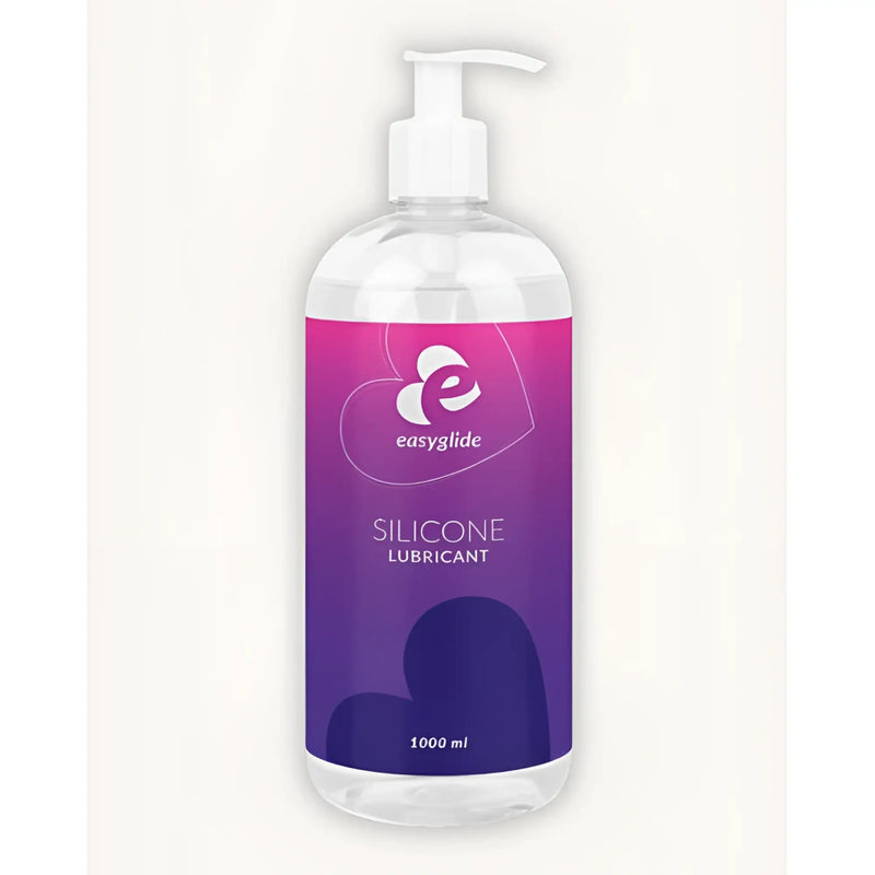 A clear plastic pump bottle with a purple and pink gradient label.