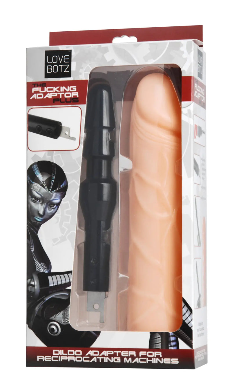 A black plastic attachment and flesh-coloured silicone phallus inside retail packaging.