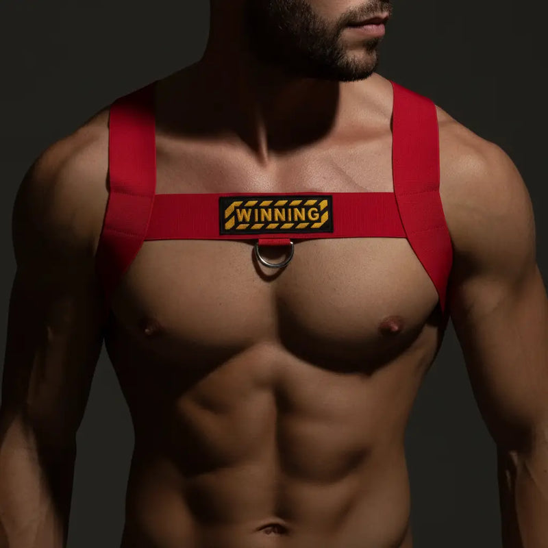 Camouflage patterned harness in black and green tones made of stretchy fabric from metro malewear m2w collection