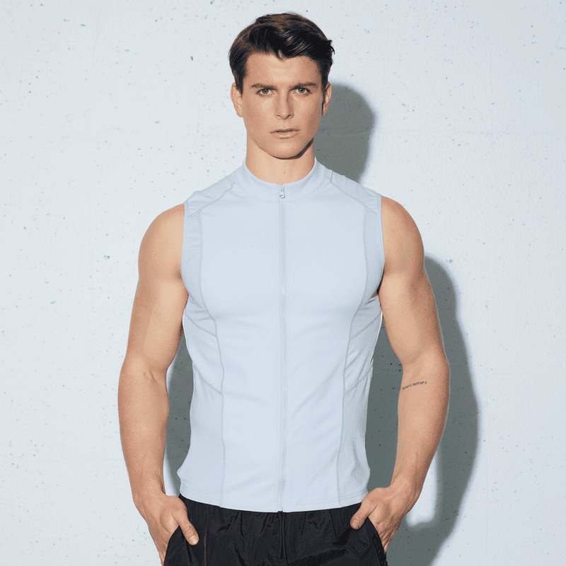 Light gray sleeveless athletic top with high collar and front zipper designed for active wear in coats and jackets collection
