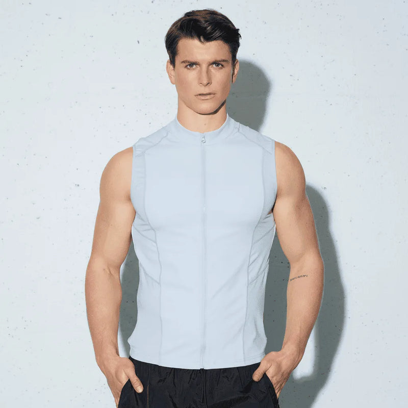 Light gray sleeveless athletic top with high collar and front zipper designed for active wear in coats and jackets collection