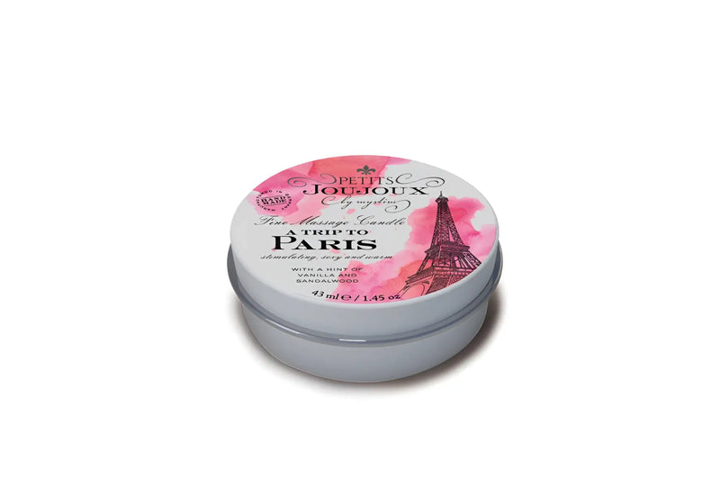 Round grey metal tin with pink watercolour print and black Eiffel Tower.