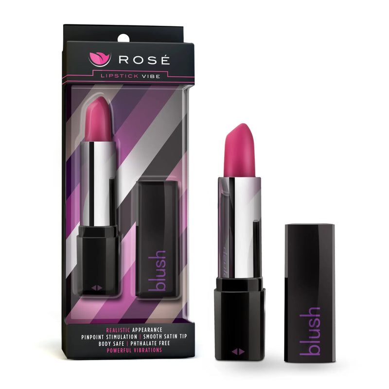 A magenta lipstick shaped object in black casing beside its box packaging.