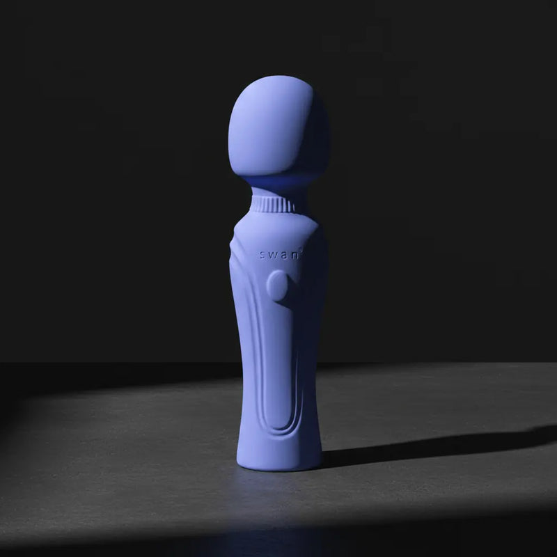 A sleek lavender-colored swan brand personal massager with smooth silicone finish and ergonomic design from Swan Vibes collection