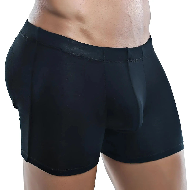 Black fitted cotton boxer briefs on a model against a white background.