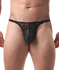 Black lace thong with sheer mesh design and solid black waistband for men in a sexy style visible from the back