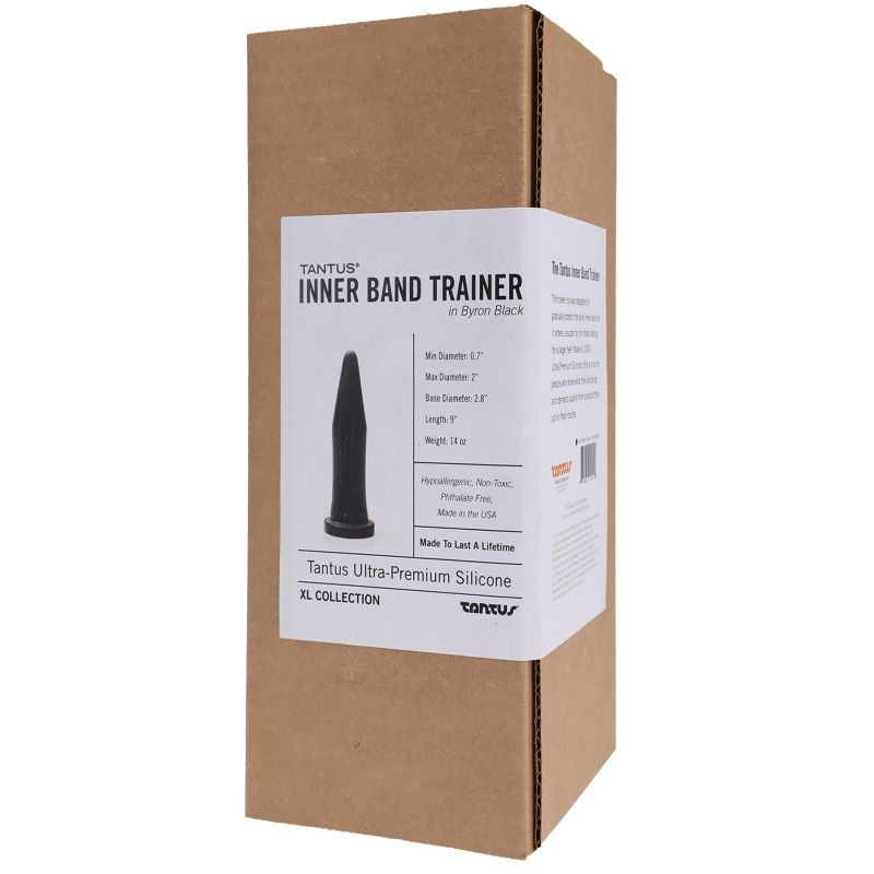 Brown cardboard box with white label displaying product details for Tantus Inner Band Trainer Onyx, a premium silicone adult toy