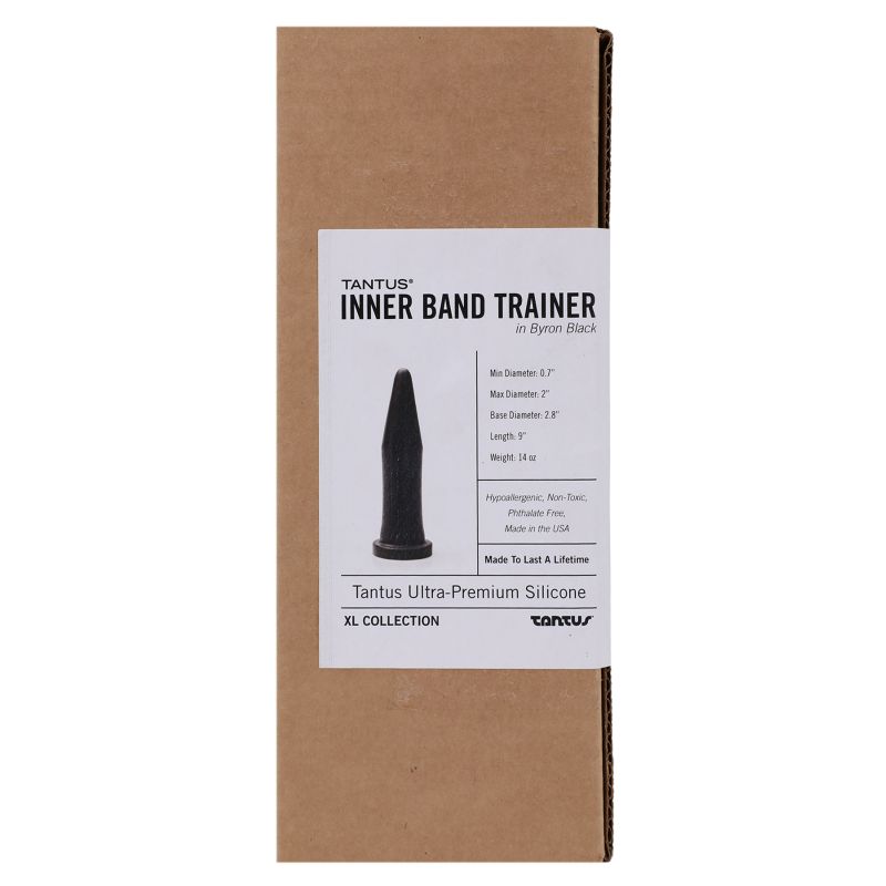 Side view of the brown packaging box with product label for Tantus Inner Band Trainer Onyx, showing size specifications and branding
