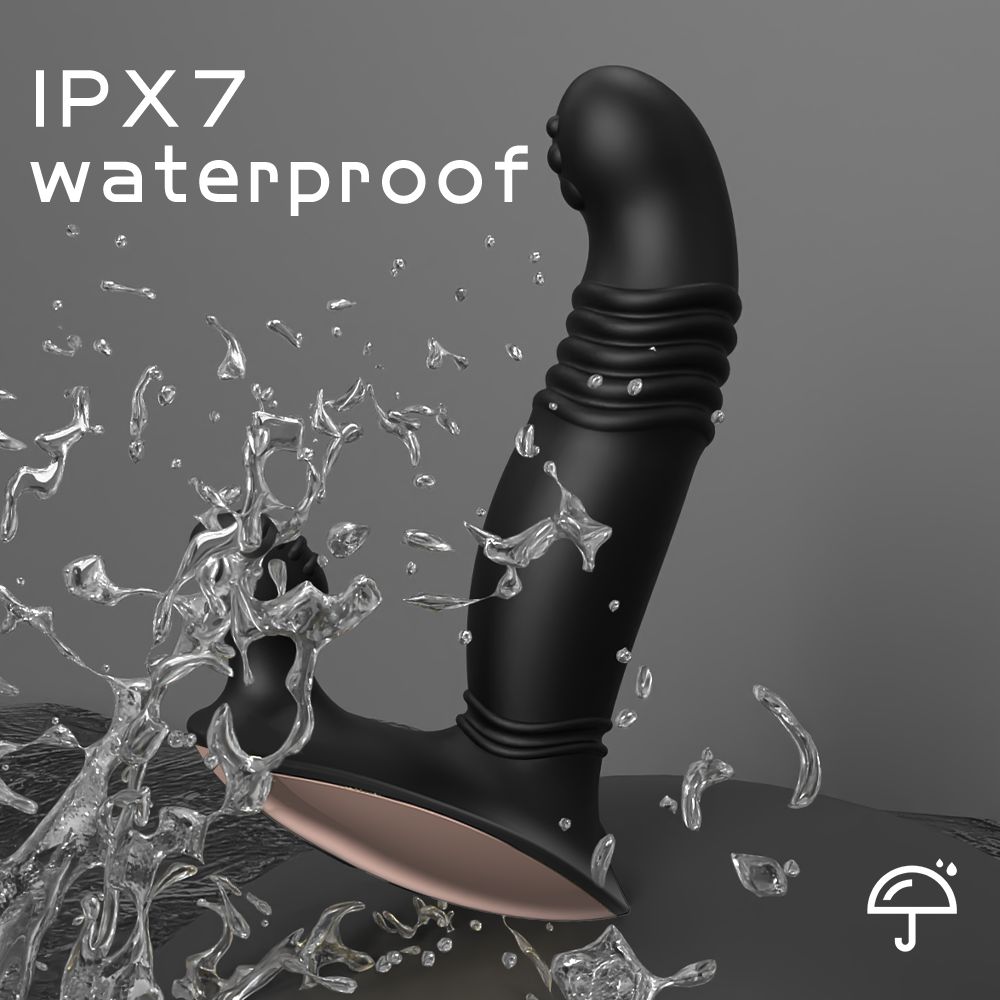 Waterproof prostate massager with IPX7 rating, black silicone design, and water splashes emphasizing waterproof feature