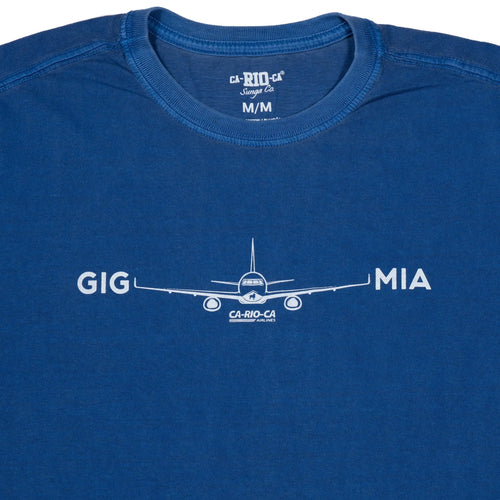 Close view of a blue T-shirt with a white aeroplane graphic and lettering.