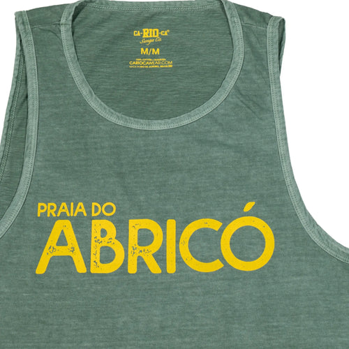 Close-up of a green tank top with large yellow lettering.