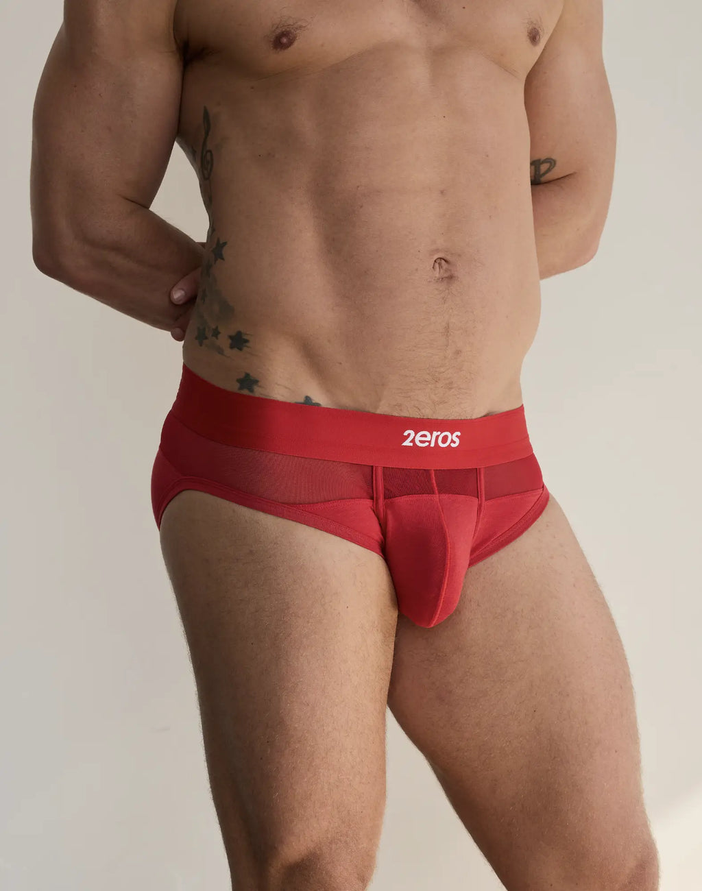 Red mesh briefs with a solid red waistband featuring the 2EROS logo from the 2EROS 3-pack Morpheus brief underwear