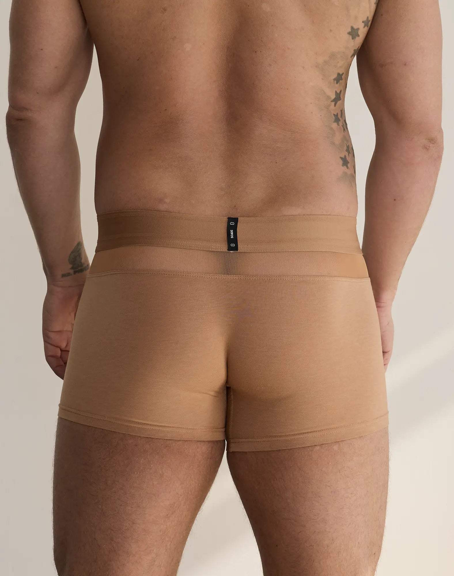 Tan 2eros morpheus trunk boxer briefs with smooth stretchy fabric and black brand tag at waistband front view