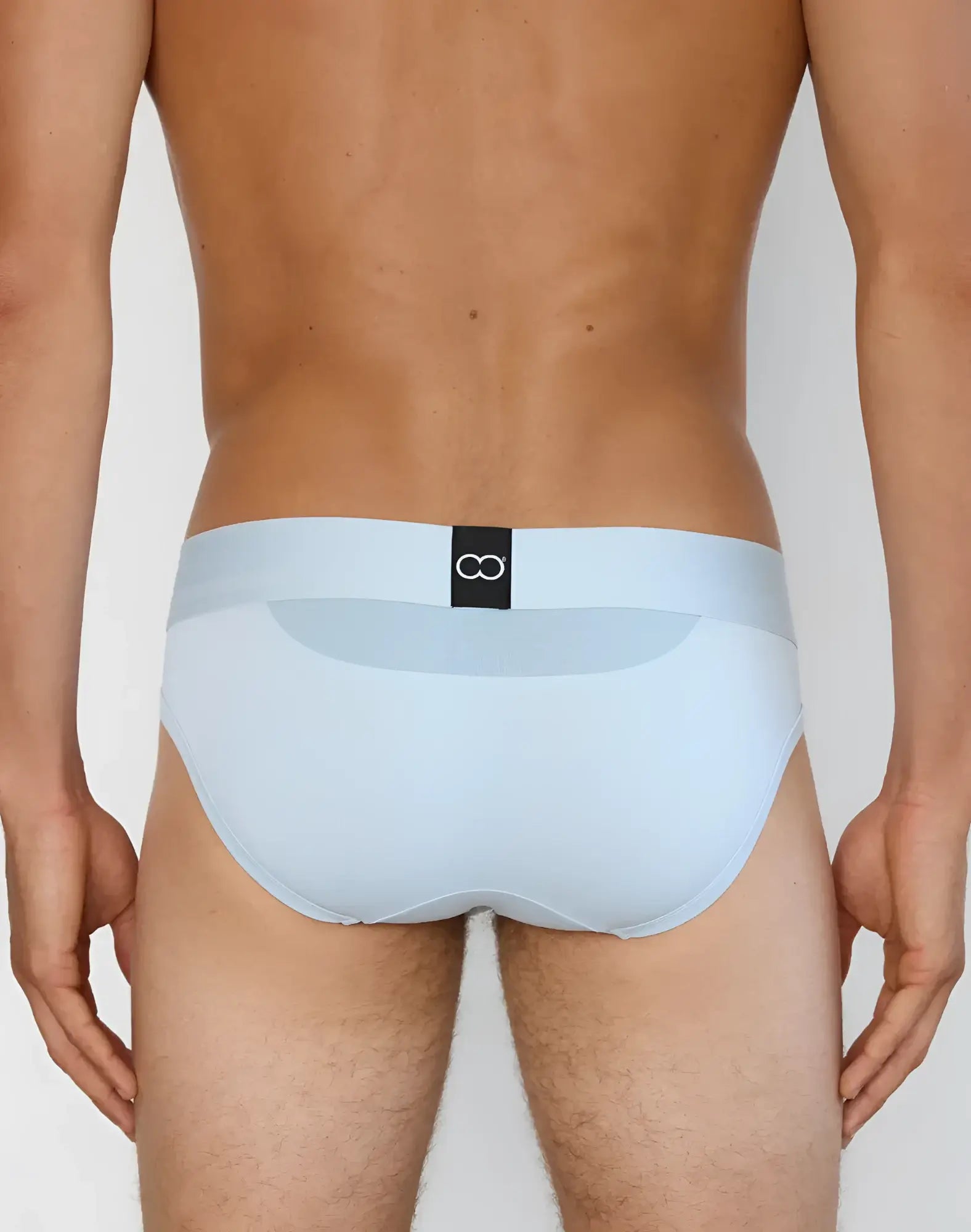 Light blue 2eros aktiv cronus briefs with a black logo patch on the waistband designed for active wear