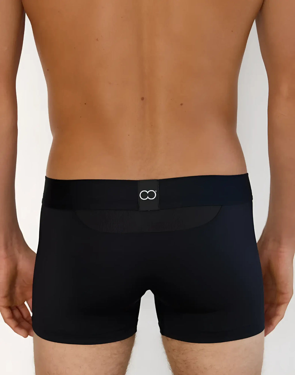 Black 2EROS AKTIV Cronus trunk underwear with smooth fabric and subtle mesh back panel featuring white infinity logo