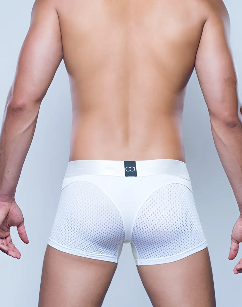 White mesh 2EROS AKTIV Pegasus trunk underwear with solid waistband and black logo tag in white and tan colors