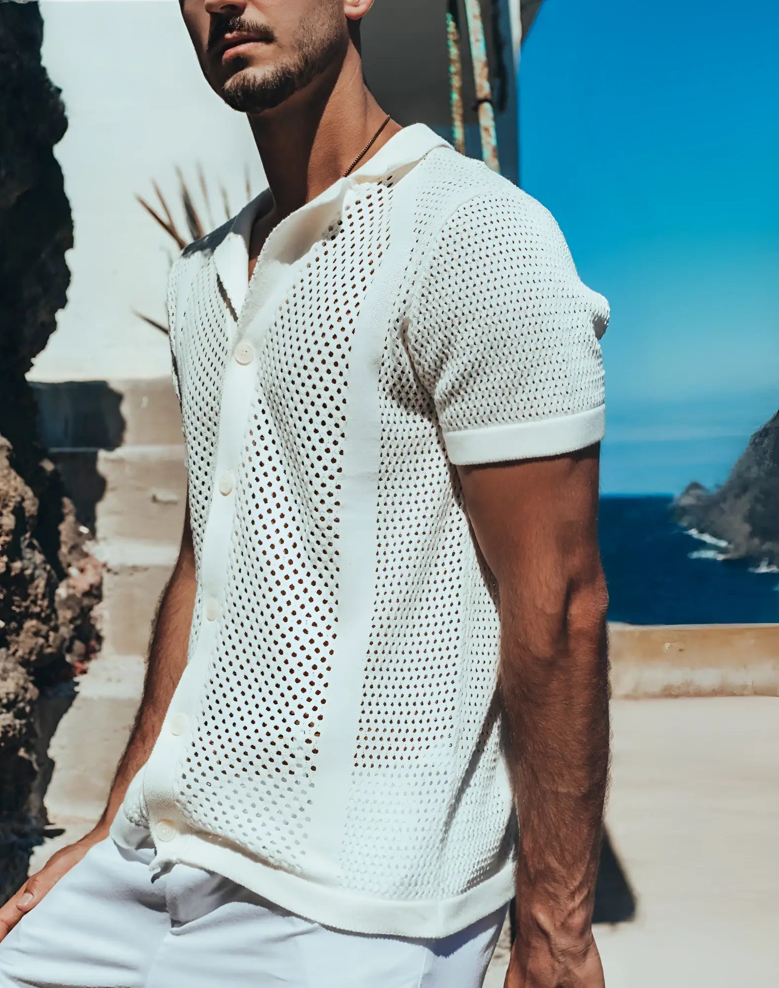 White perforated knit polo shirt with short sleeves and button front from 2EROS Amalfi Shirt collection