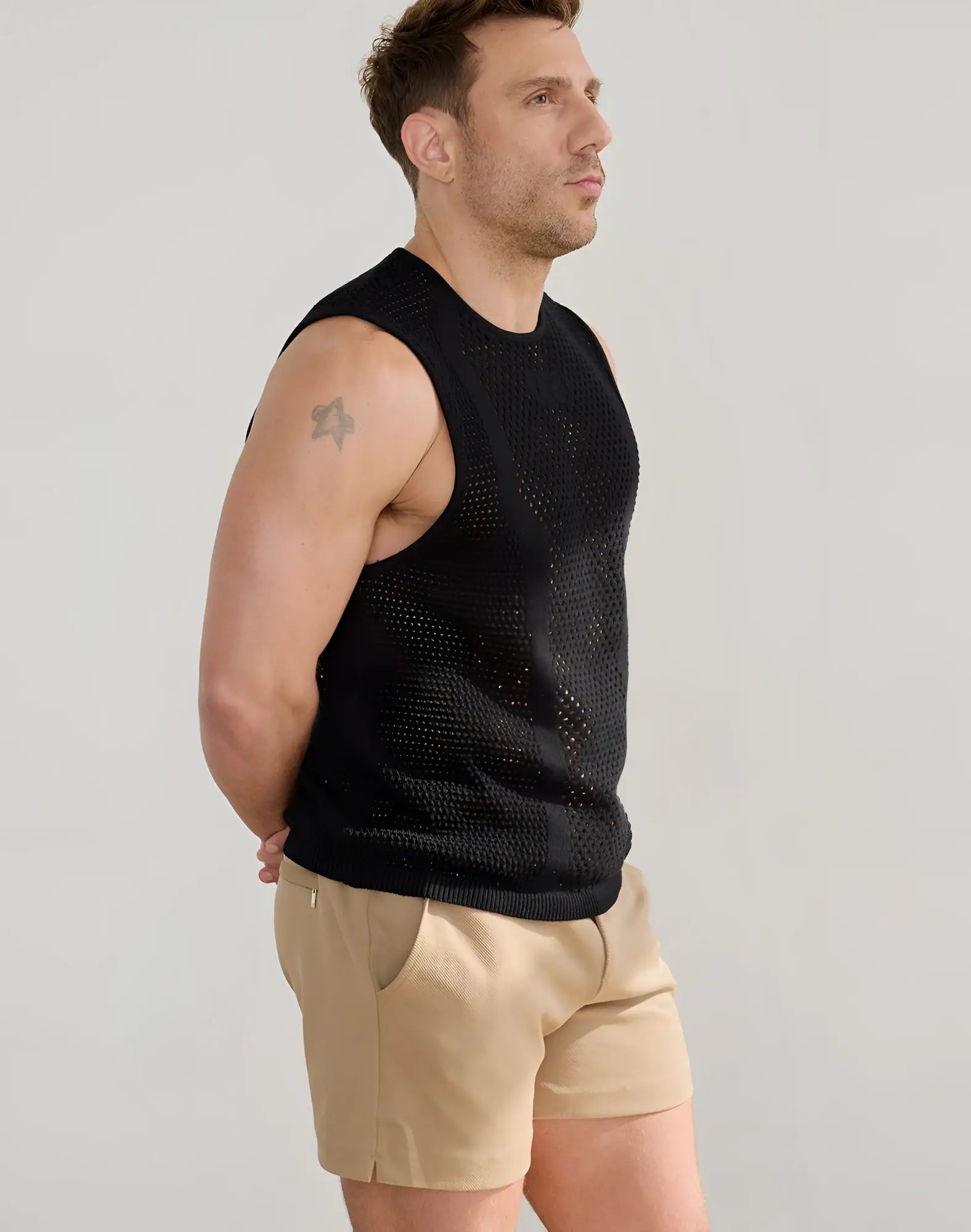 Black mesh sleeveless 2EROS Amalfi singlet with ribbed hem for breathable stylish summer wear