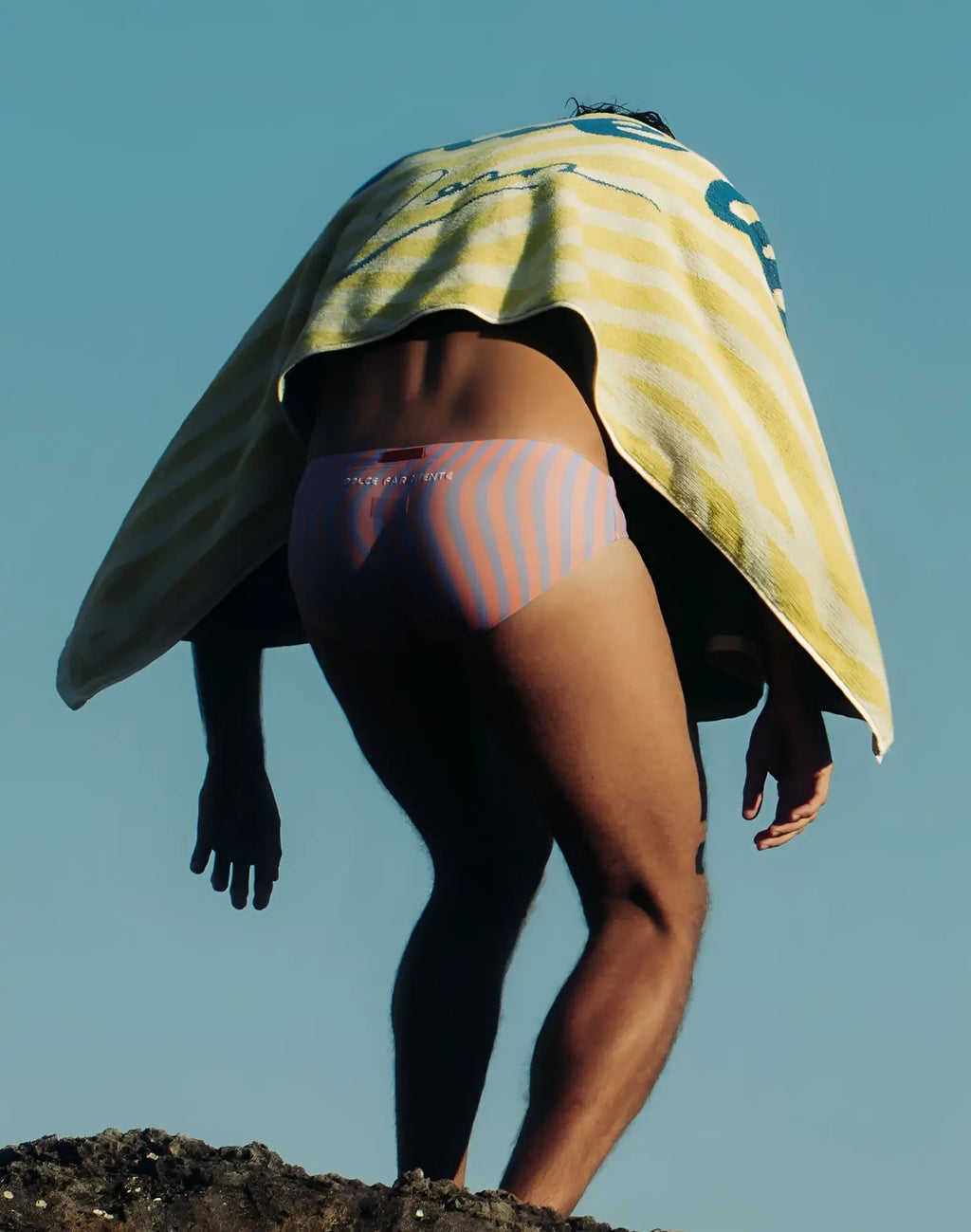 A pair of 2eros men’s briefs with vertical pink and light blue stripes featuring a small logo on the waistband