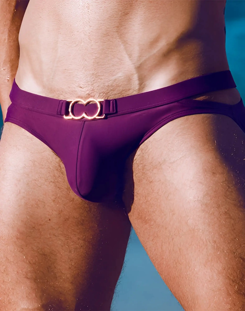 Purple 2EROS BLK Label No4 swim brief with a gold-toned heart-shaped belt buckle for stylish swimming