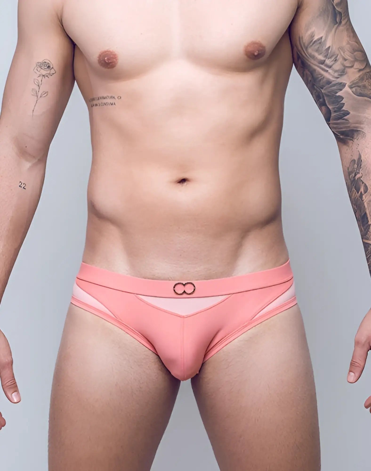 2eros blk label no 6 coral swim brief in pink with subtle mesh panel and infinity symbol logo on waistband