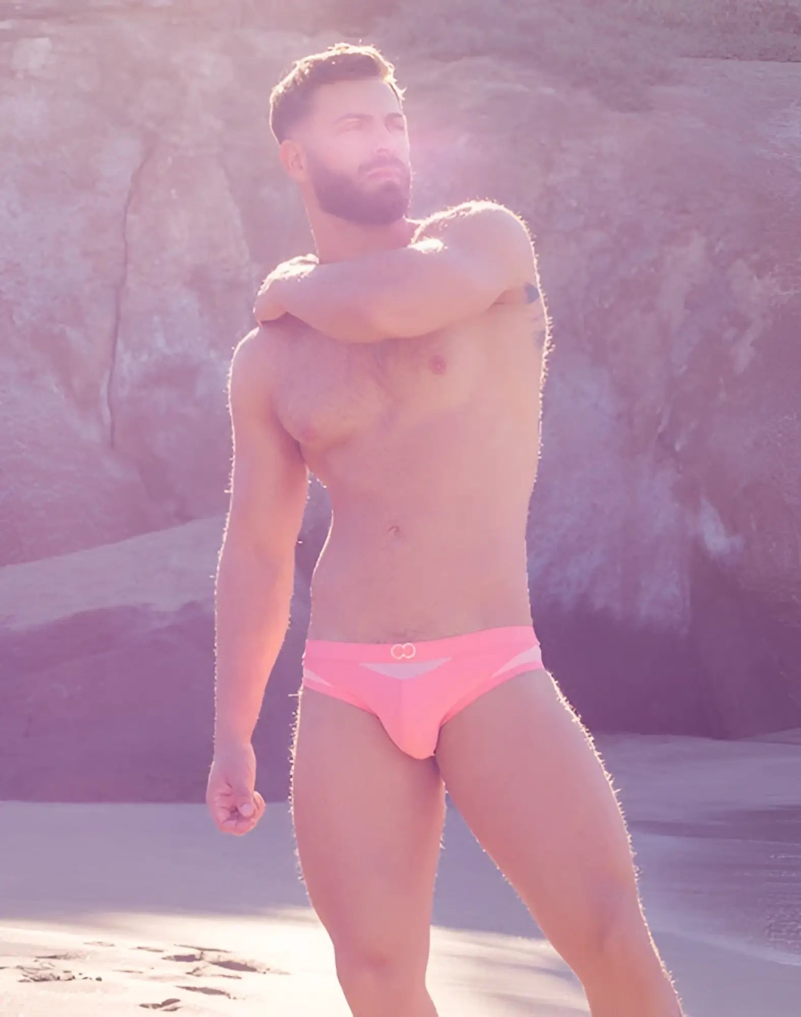 Pink 2EROS BLK Label No6 swim brief with white logo on front designed for swimming and beachwear