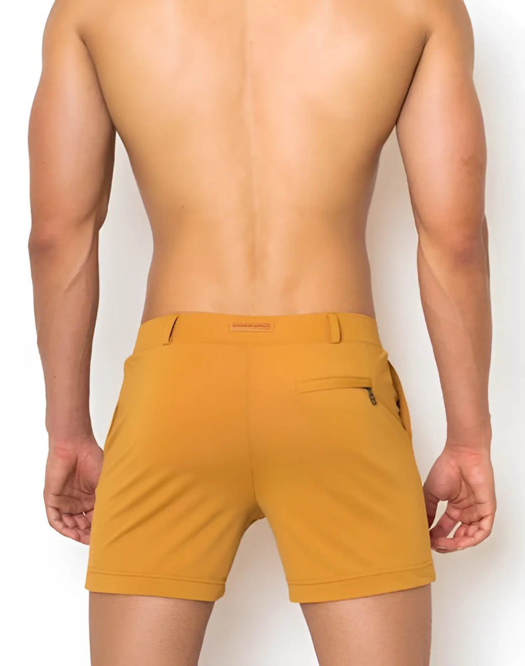 2EROS Bondi almond mustard-yellow athletic shorts with sleek modern design and subtle side pockets for activewear