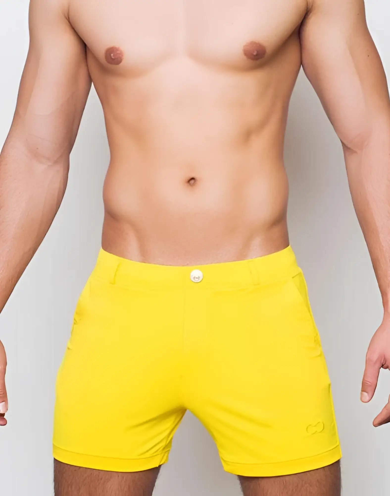 Bright yellow 2EROS Bondi shorts Series 2 with clean tailored design and small embroidered logo on lower right leg