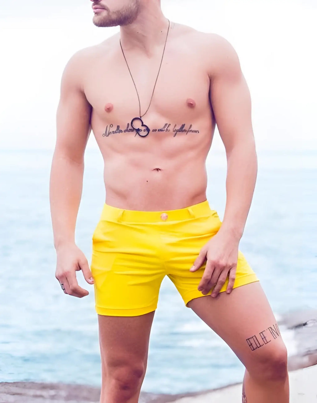 Bright yellow 2EROS Bondi Shorts Series 2 swim trunks with button waist closure and simple clean design