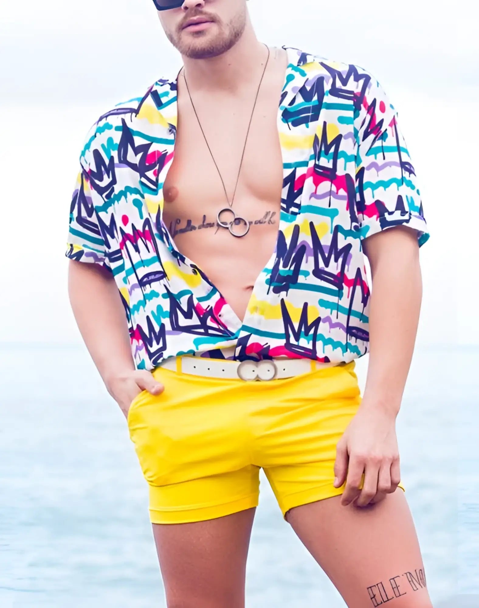 Bright yellow 2EROS Bondi shorts with a white belt and two silver-toned circular buckles in gold series 2