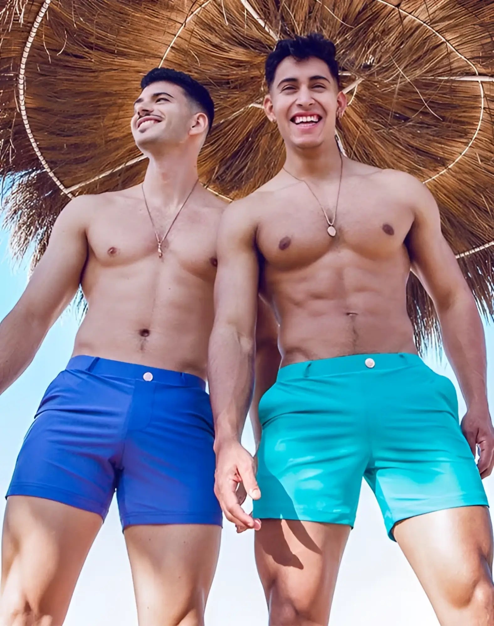 Blue and teal 2EROS Bondi Shorts series 3 swim trunks with button closures in breeze green perfect for beachwear
