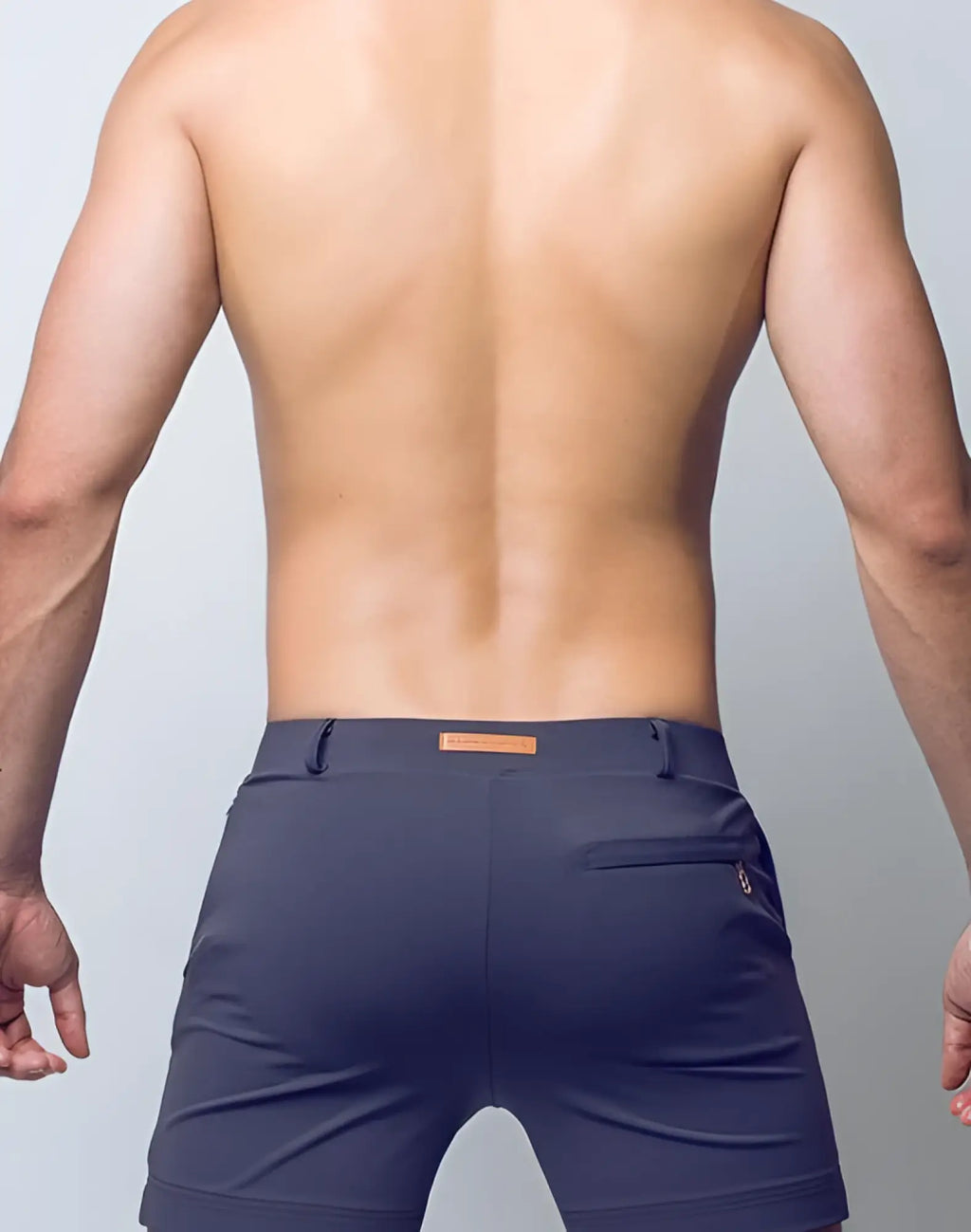 Dark blue 2eros bondi athletic shorts with subtle texture and orange leather-like brand tag at waistband