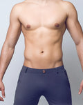 Navy blue tailored trousers with subtle gold toned button at waistband from 2EROS Bondi Shorts Series 3 charcoal