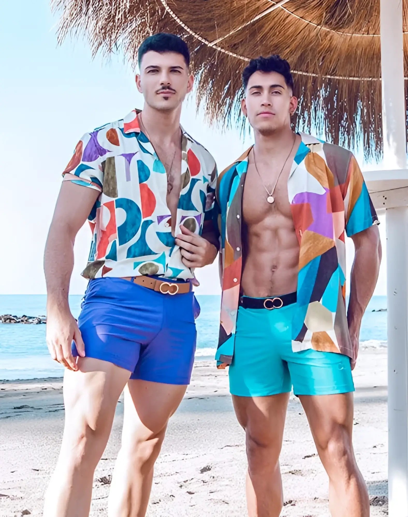 Vibrant geometric-patterned short-sleeved shirt with bold multicolored abstract design in dusted purple by 2EROS