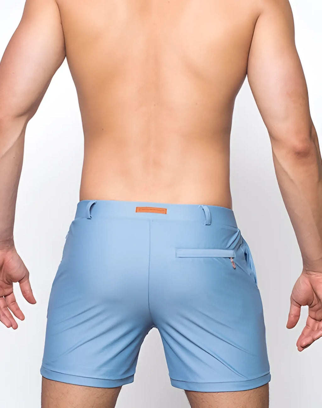 Light blue 2EROS bondi shorts series 3 with subtle texture orange brand tag and zippered pocket in faded denim