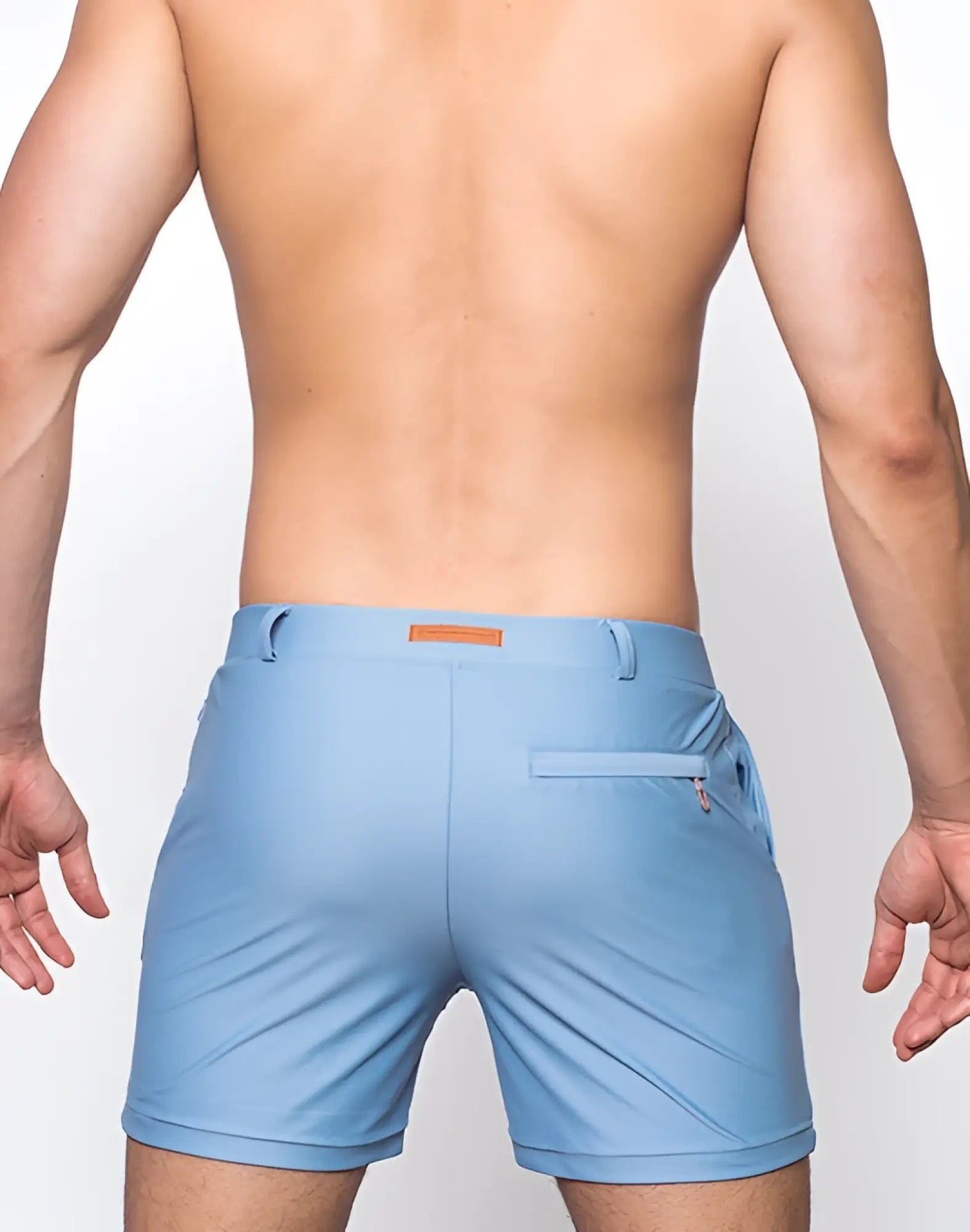 Light blue 2EROS bondi shorts series 3 with subtle texture orange brand tag and zippered pocket in faded denim