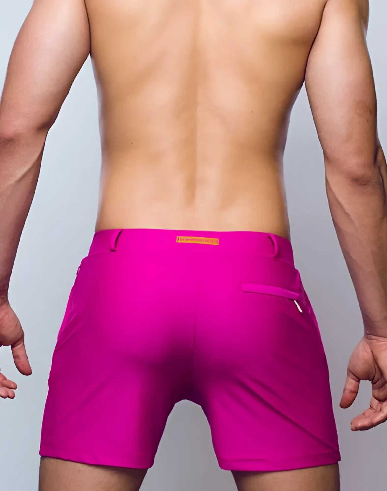 2eros bondi shorts series 3 in bright fuchsia red with sleek modern design and orange belt loop accent