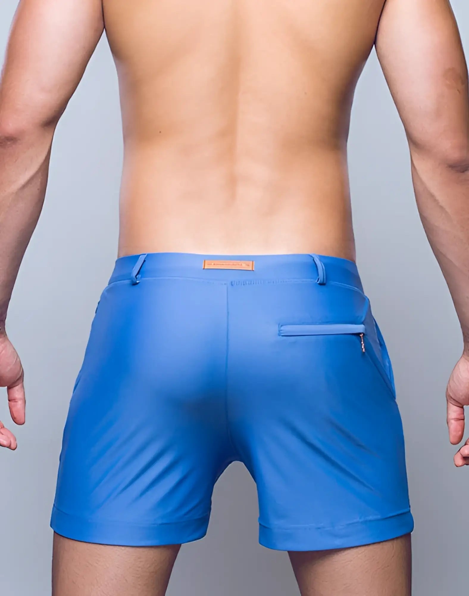 Bright blue 2EROS Bondi Shorts Series 3 athletic shorts with a sleek design and small orange brand tag at waistband
