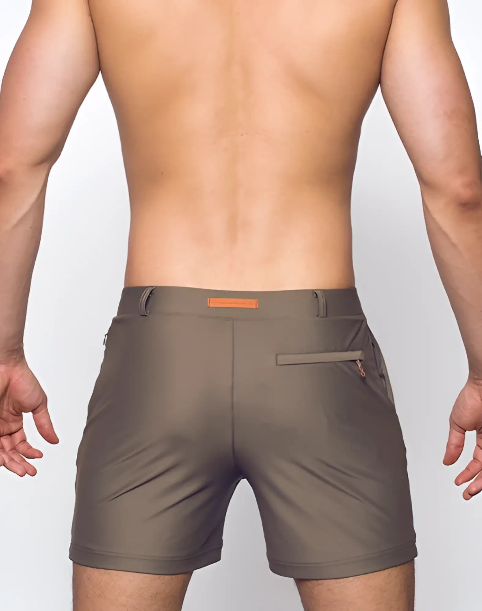 Olive green 2eros bondi shorts with subtle textured fabric and orange brand tag on the waistband in shitake color