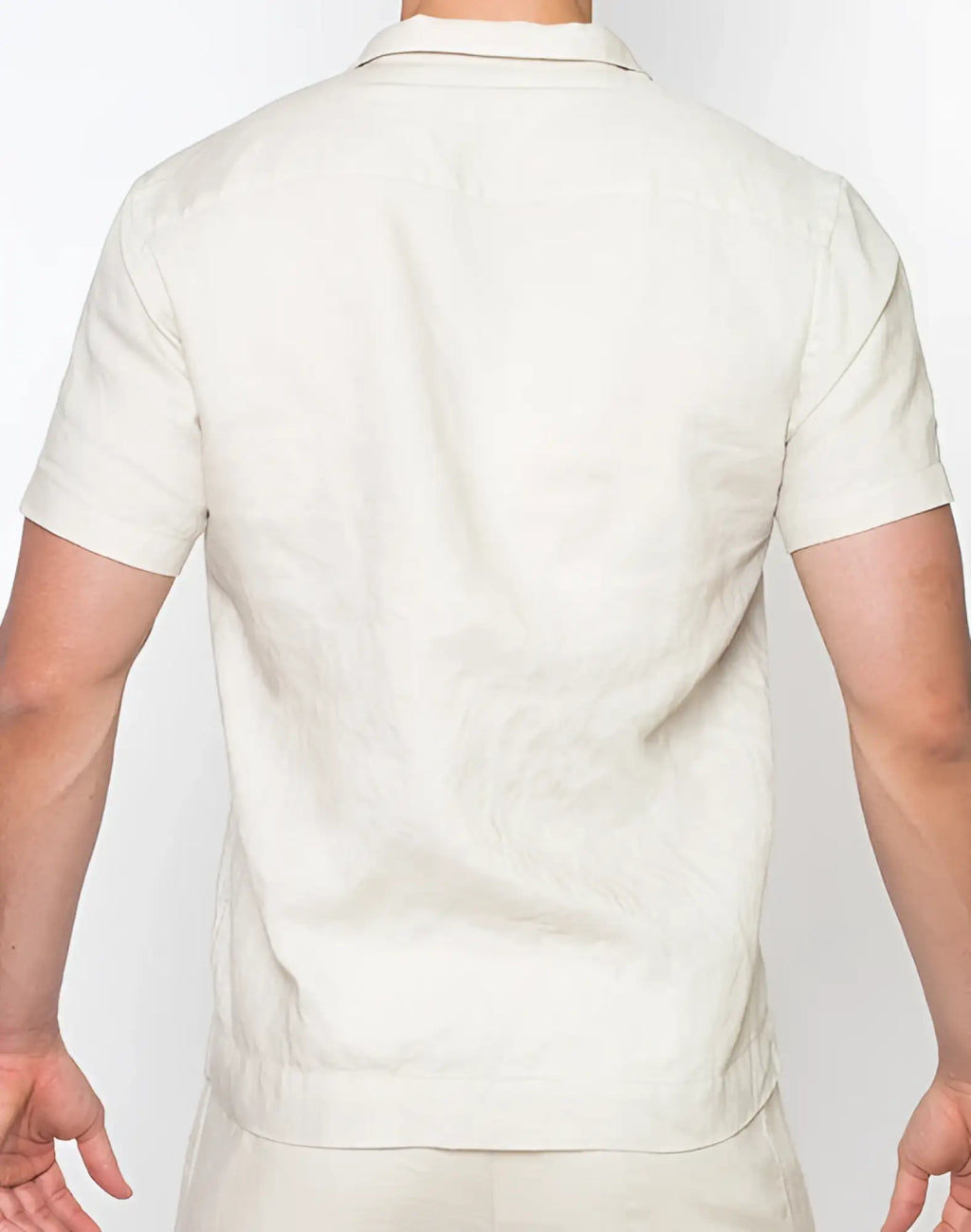 Beige short-sleeved linen polo shirt with classic collar and subtle texture from 2eros breezy linen collection