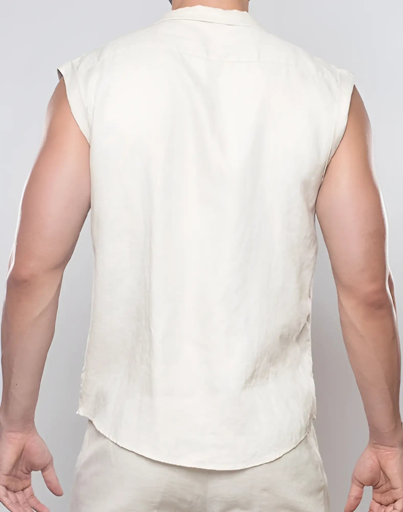 A light beige sleeveless linen shirt with collar and subtle texture 2EROS Breezy Linen Single Button Wrap Vest