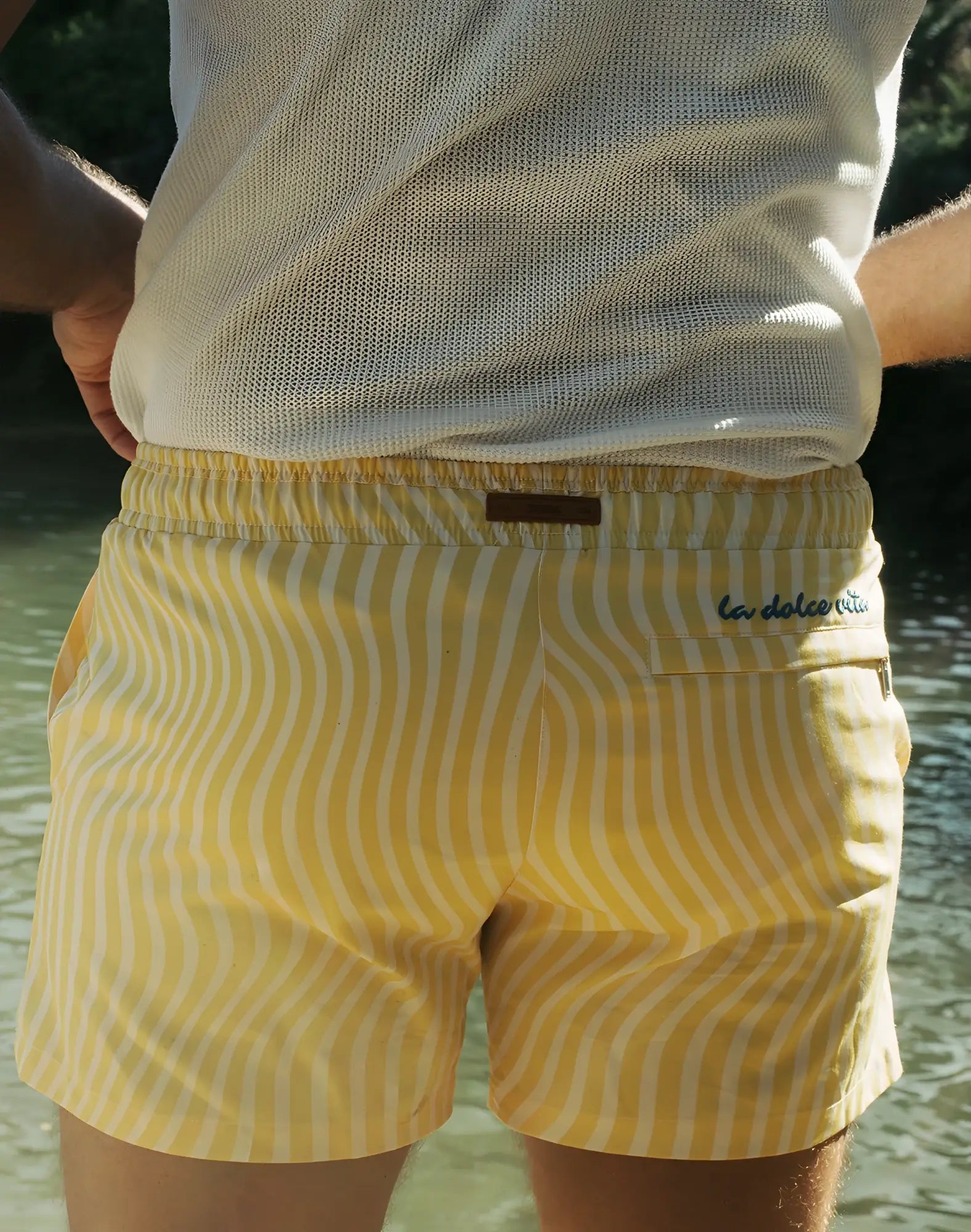 2eros Byron shorts yellow swim trunks with white wavy stripes and brown waistband label for beachwear